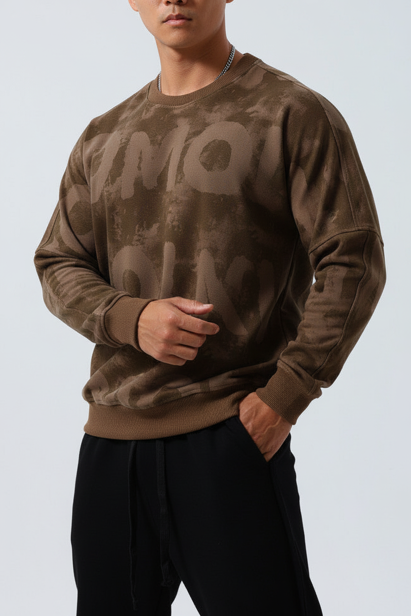 Model wearing brown sweatshirt with black sweatpants